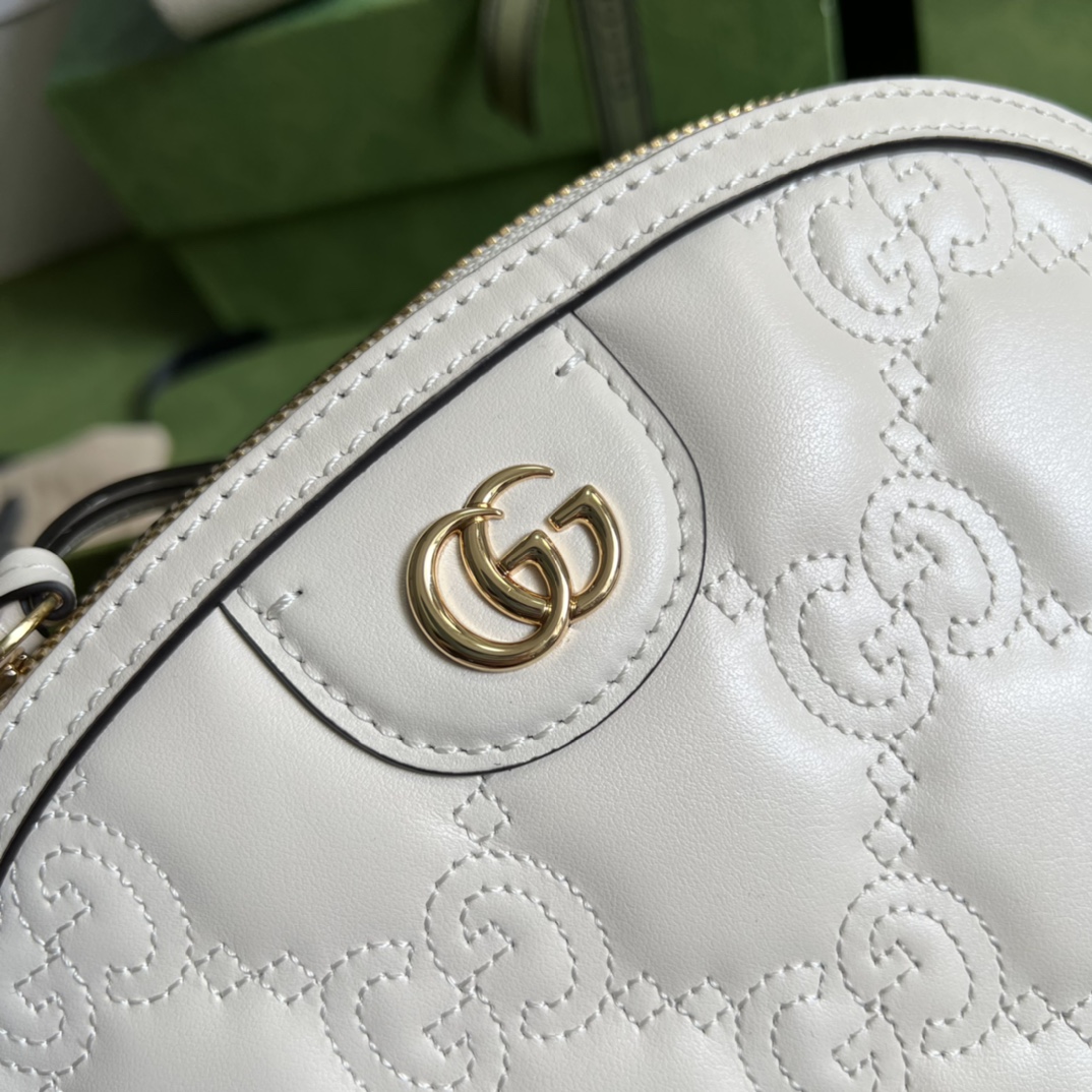 GG Matelassé leather small bag