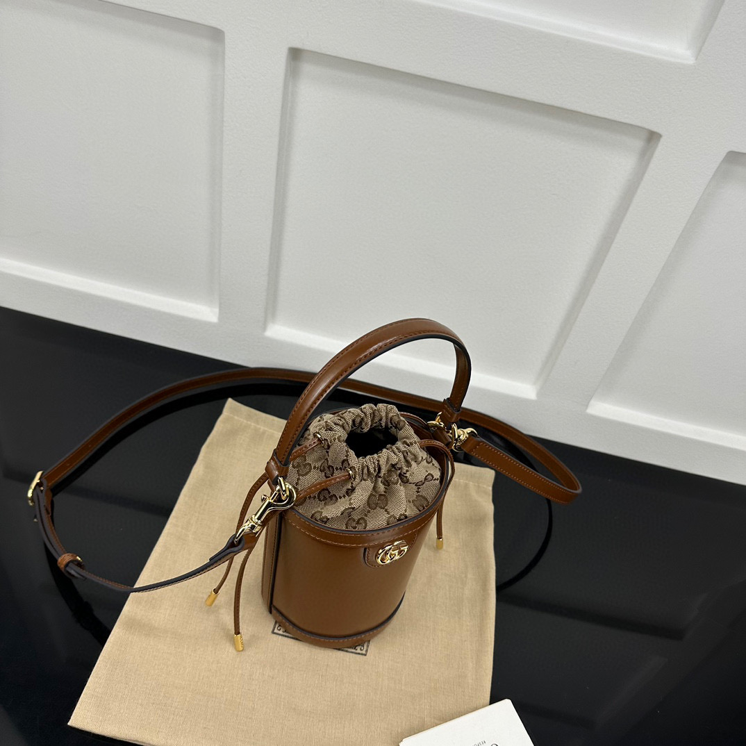 Gvc*1 Ophidia mini bucket bag in brown leather