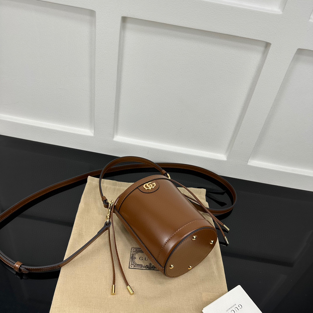 Gvc*1 Ophidia mini bucket bag in brown leather