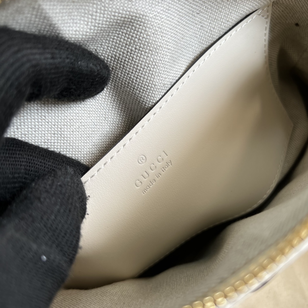 GG Matelassé leather small bag