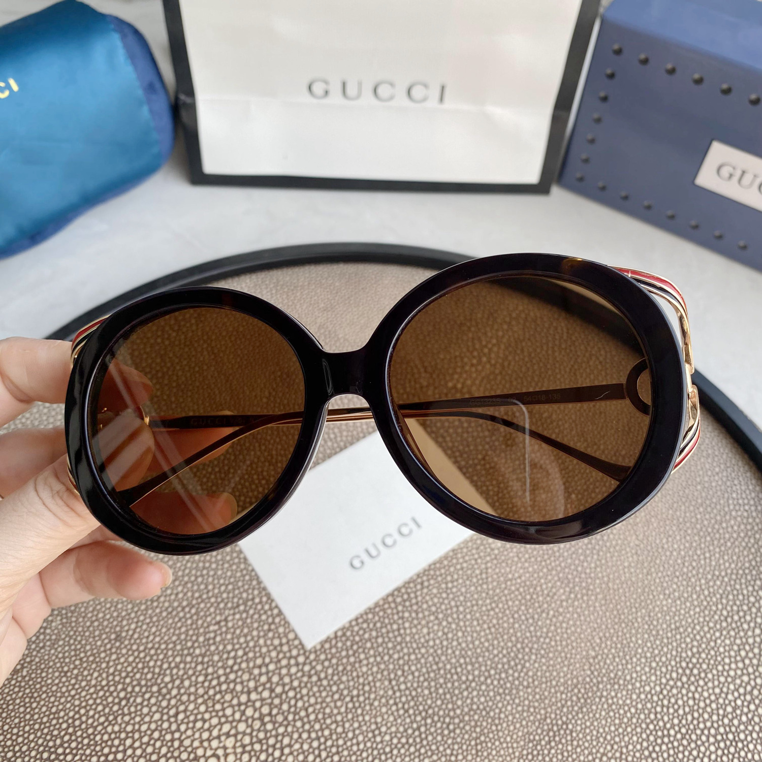 ROUND-FRAME INTERLOCKING G SUNGLASSES
