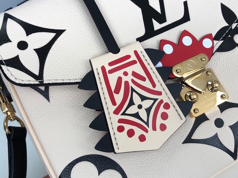 LV CRAFTY POCHETTE MÉTIS