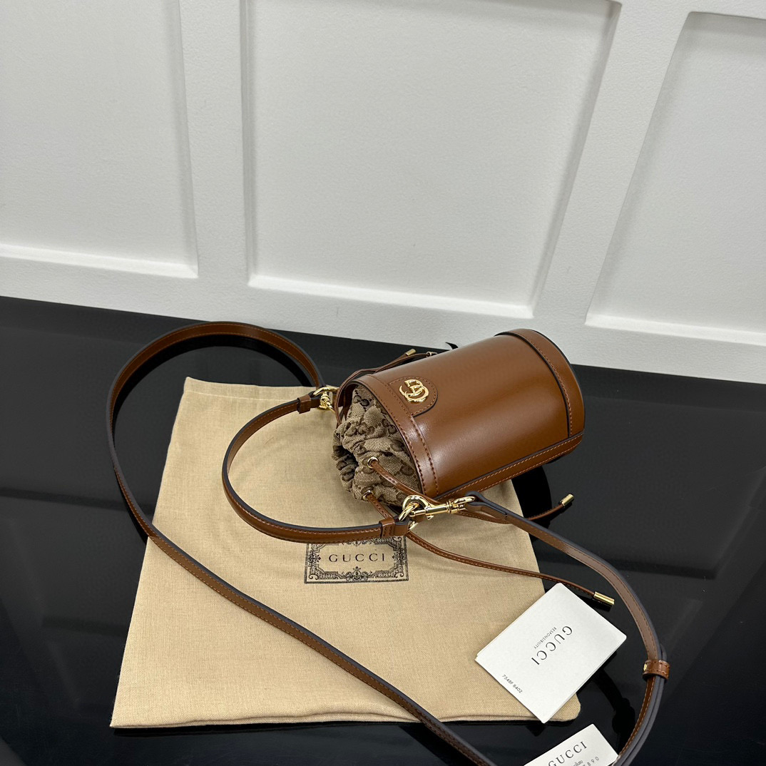Gvc*1 Ophidia mini bucket bag in brown leather