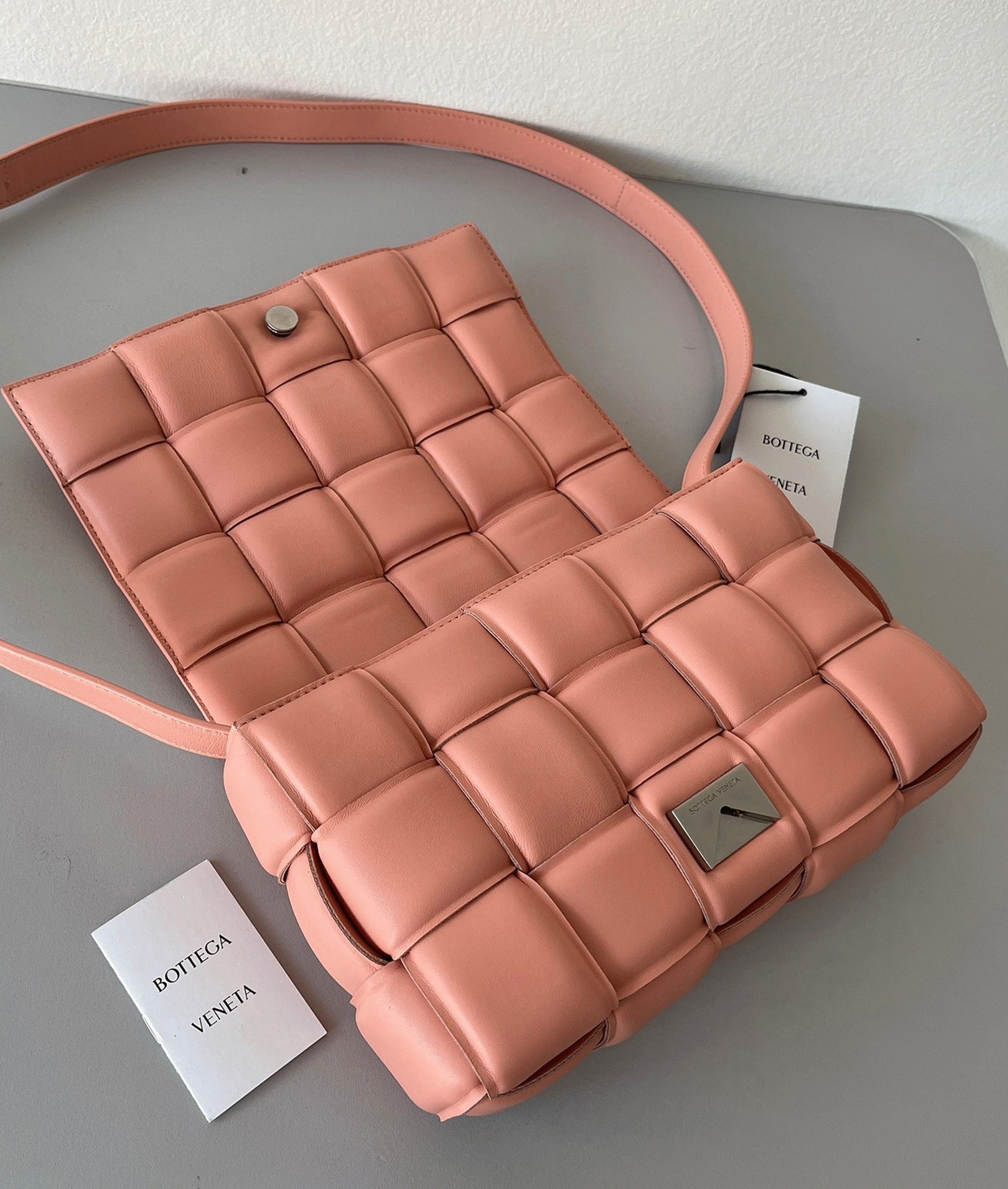 Top Quality Fake B0tt*ga Ven*ta Padded Cassette Bag In Peachy