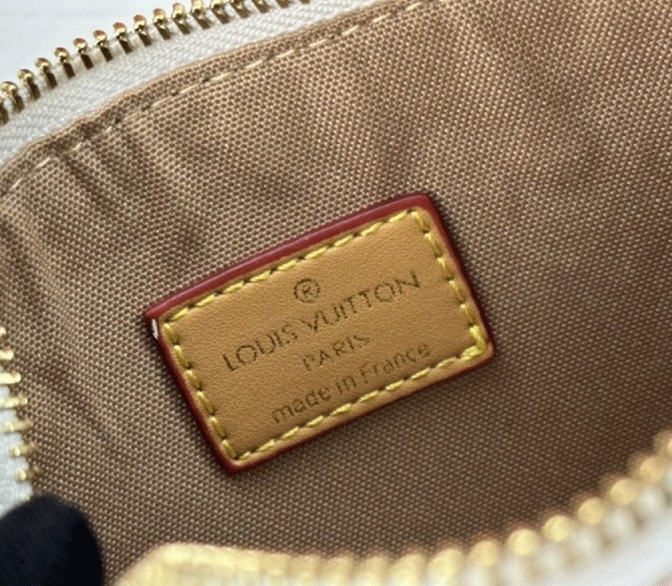 L0vis Vvtt0n Monogram Dune Canvas Nano Alma Bag