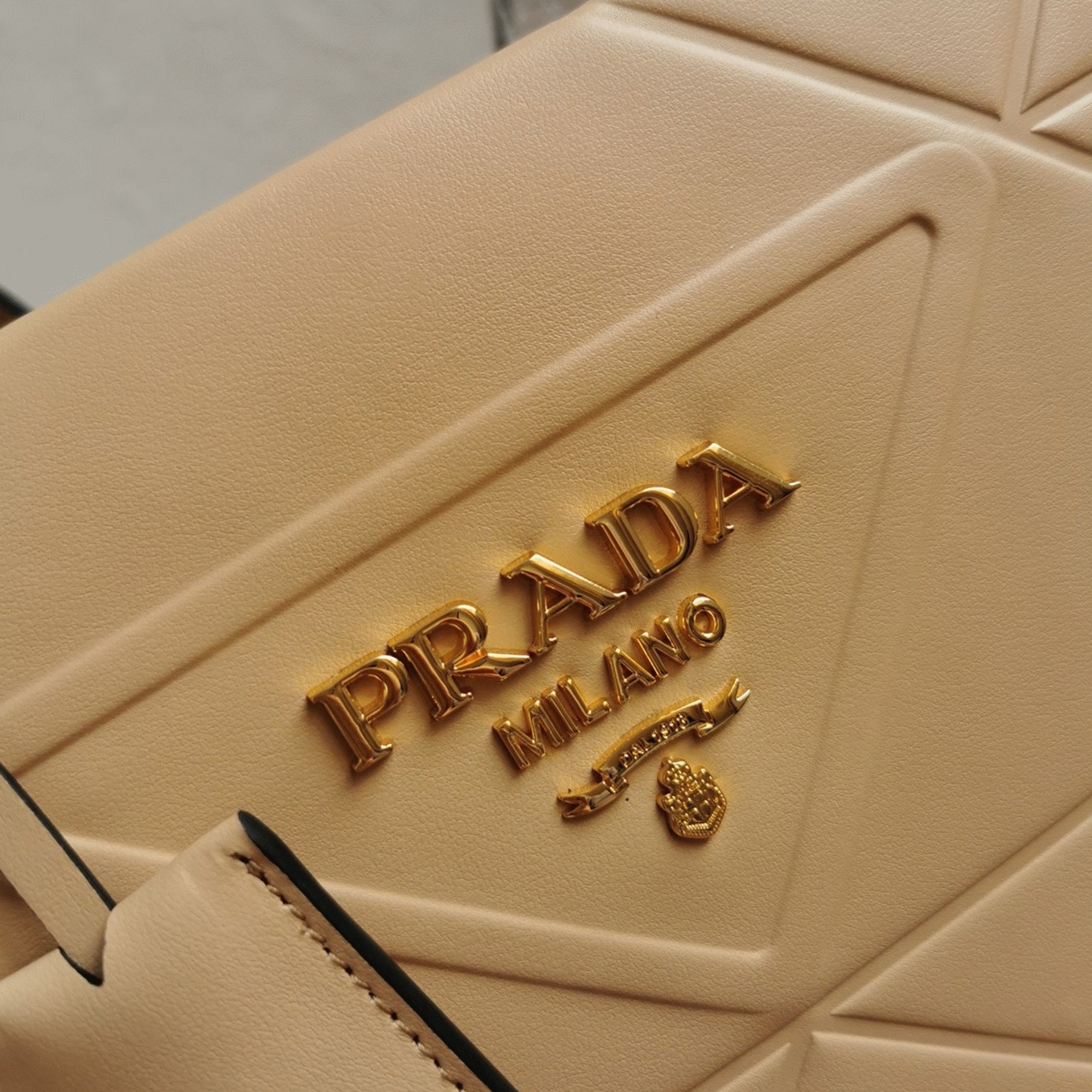 Pra*a Symbole Small Bag Imitation with Topstitching in Beige