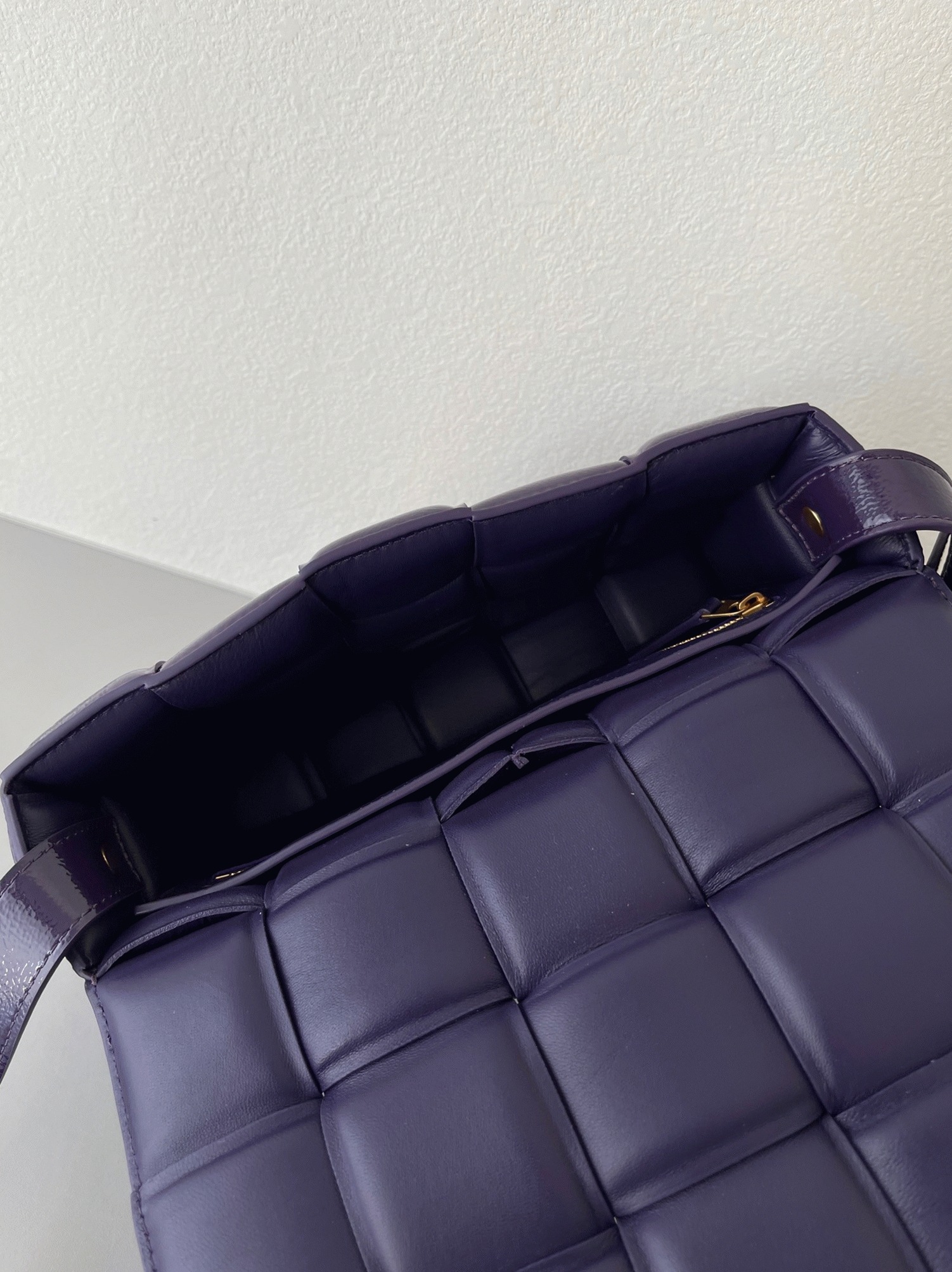 Top Quality Fake B0tt*ga Ven*ta Padded Cassette Bag In Purple