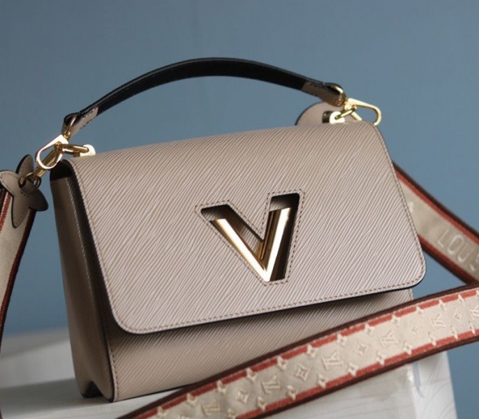 L0vis Vvtt0n Epi Leather Twist MM Handbag In Galet Gray With Embroidered Strap