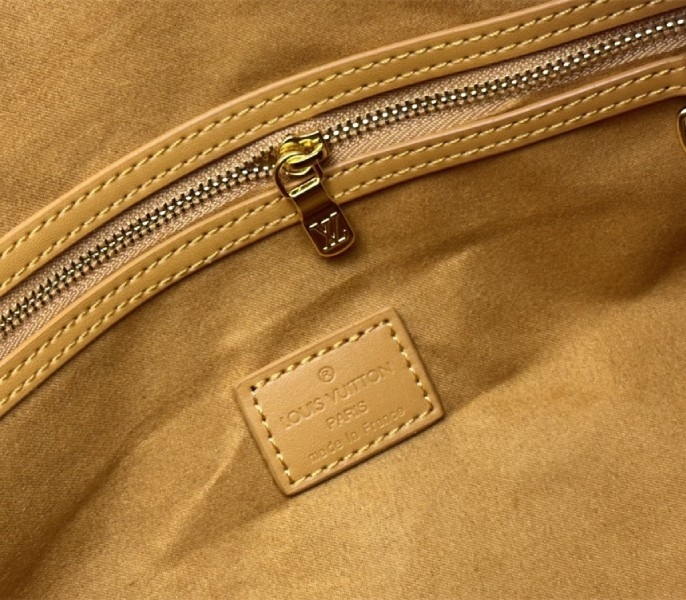 L0vis Vvtt0n Monogram Heritage Canvas Keepall Bandouliere 50 In Yellow