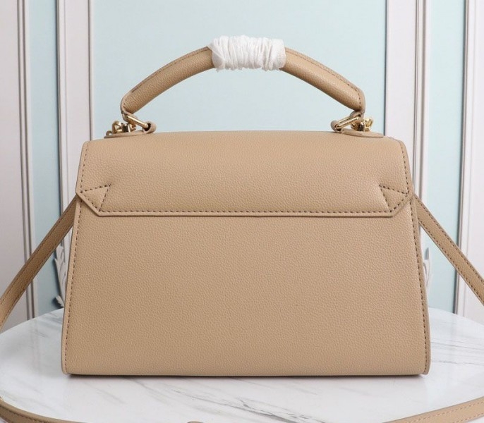 L0vis Vvtt0n Twist One Handle MM Handbag In Beige