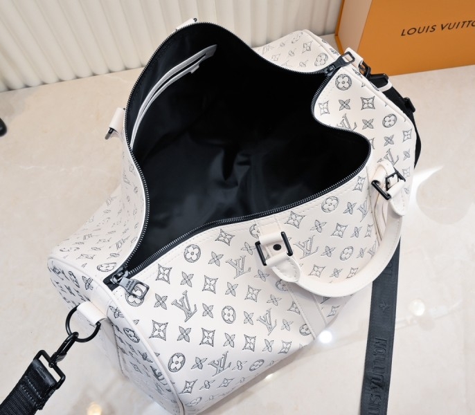 LV Monogram Shadow Keepall Bandouliere 50 In White