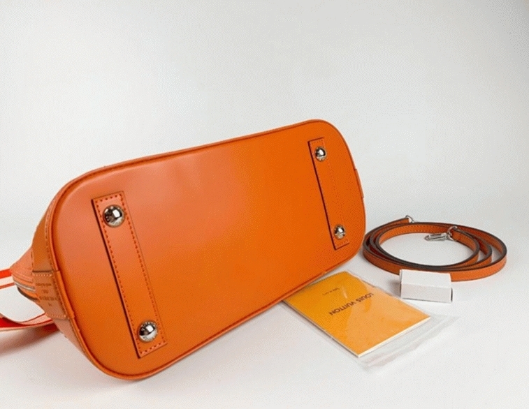 L0vis Vvtt0n Epi Leather Alma PM Handbag In Orange With Jacquard Strap