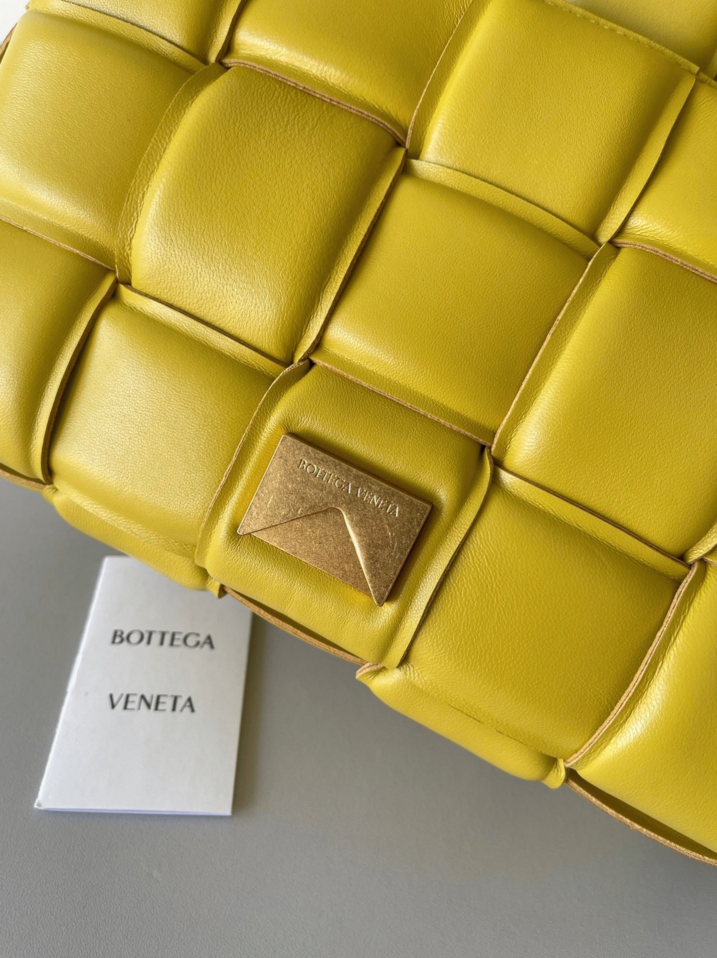 Top Quality Fake B0tt*ga Ven*ta Padded Cassette Bag In Yellow