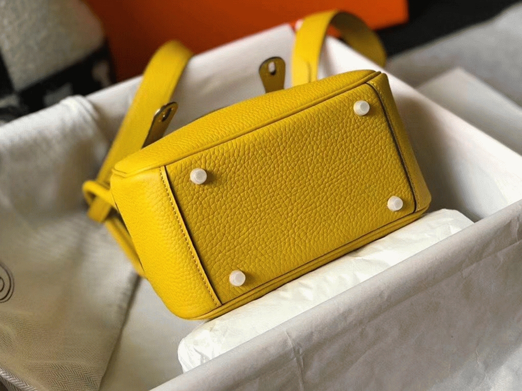 Fake luxury H**me5 Lindy Mini handbag in yellow clemence leather
