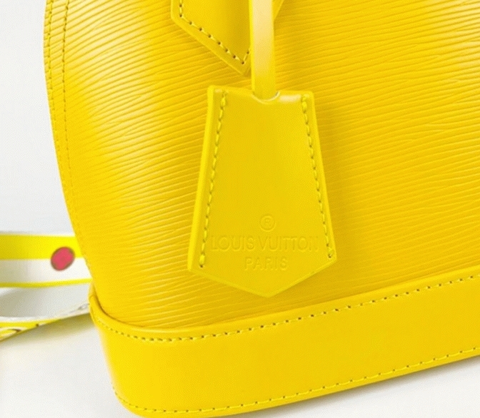 L0vis Vvtt0n Epi Leather Alma BB Handbag In Cedrat Yellow With Jacquard Strap