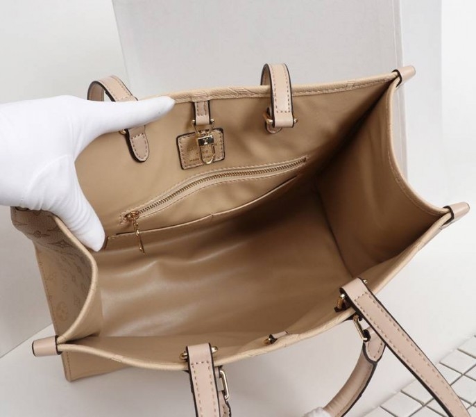 L0vis Vvtt0n Monogram Empreinte Giant Onthego MM Bag In Beige