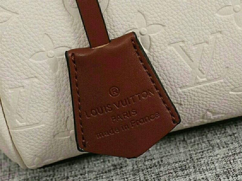 L0vis Vvtt0n Monogram Empreinte Speedy Bandouliere 25 Handbag In Cream