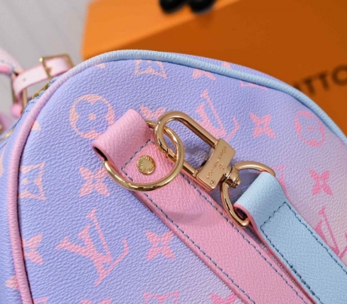 l0vis vvtt0n spring 2022 keepall 45 lU*gage in sunrise pastel