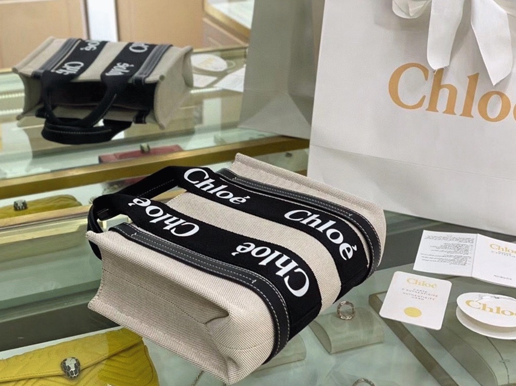 top quality replica Ch10e small woody tote bag in canvas with black leather strips