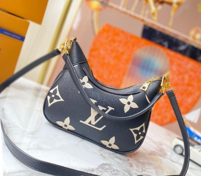L0vis Vvtt0n Bicolor Monogram Empreinte Leather Bagatelle Mini Hobo In Black