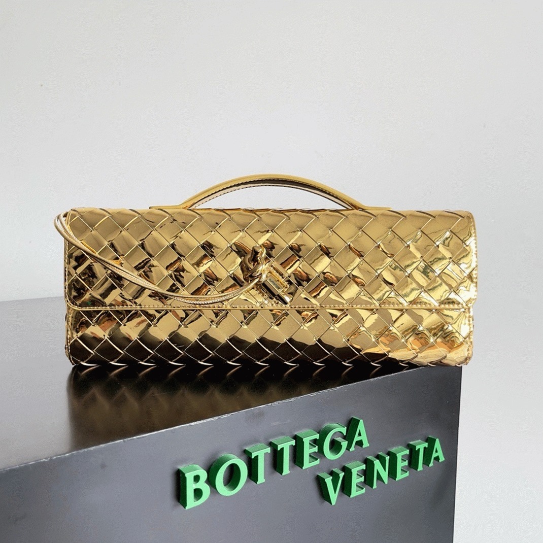 Fake B0tt*ga Ven*ta Andiamo Clutch with Handle Gold