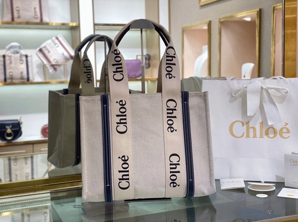 top quality knockoff Ch10e medium woody tote bag in canvas with blue leather strips