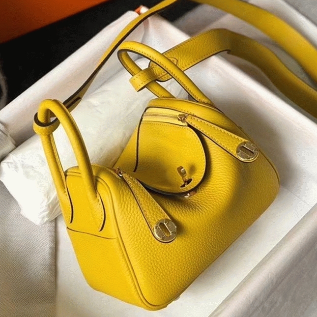 Fake luxury H**me5 Lindy Mini handbag in yellow clemence leather