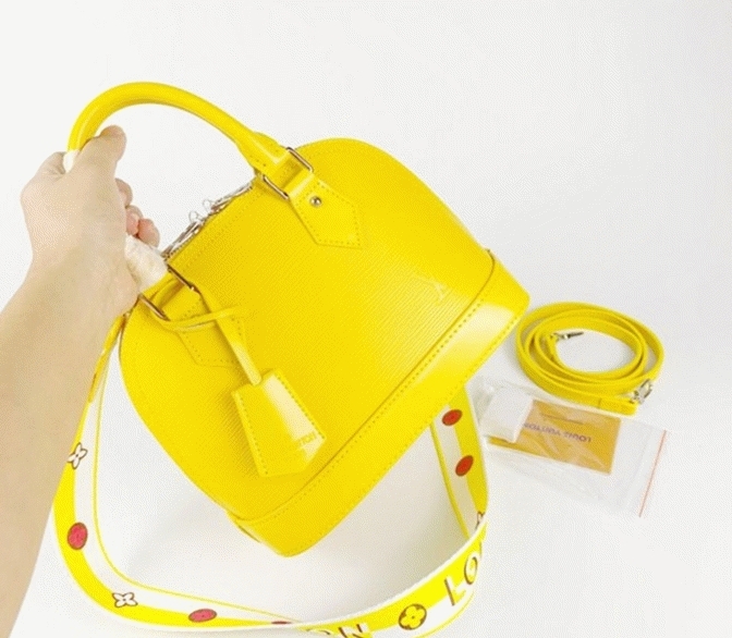 L0vis Vvtt0n Epi Leather Alma BB Handbag In Cedrat Yellow With Jacquard Strap