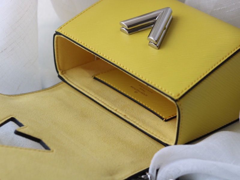 L0vis Vvtt0n Epi Leather Twist Mini Bag In Yellow