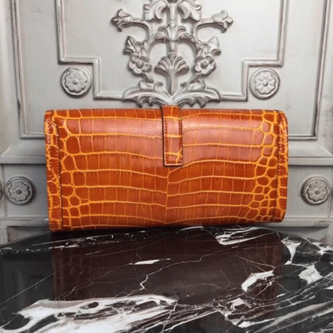 Orange crocodile leather knockoff H**me5 Jige Elan clutch bag
