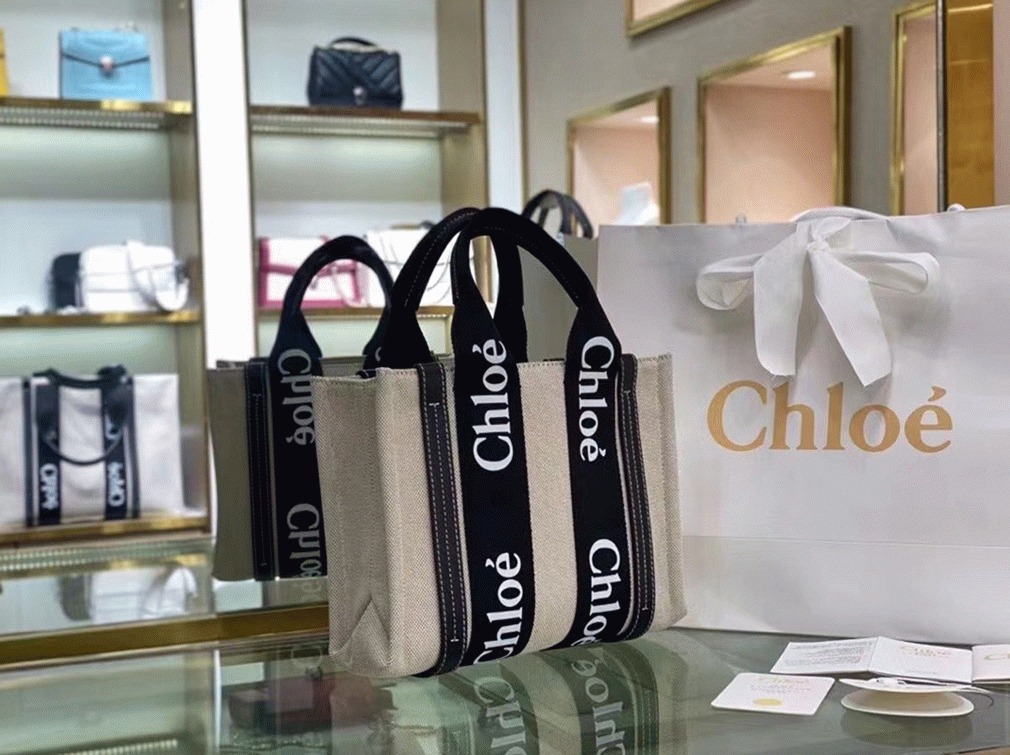 top quality replica Ch10e small woody tote bag in canvas with black leather strips