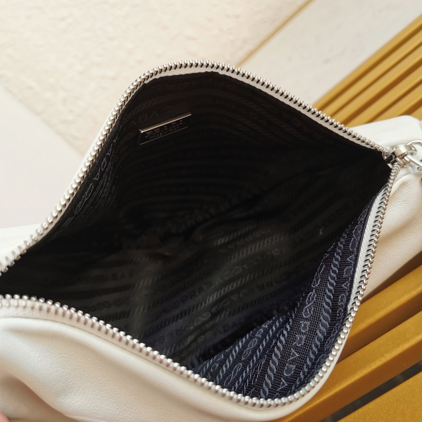 Pra*a Triangle Shoulder Bag Fake in White