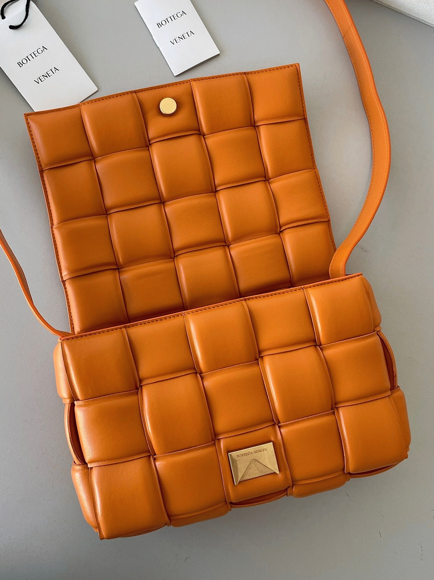 Top Quality Faux B0tt*ga Ven*ta Padded Cassette Bag In Orange