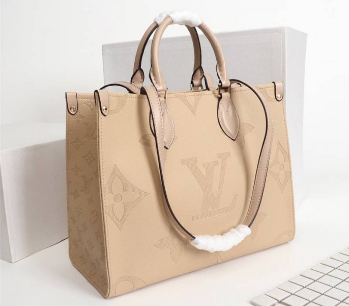 L0vis Vvtt0n Monogram Empreinte Giant Onthego MM Bag In Beige