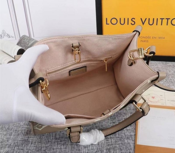 L0vis Vvtt0n Bicolor Monogram Empreinte Leather Onthego PM Bag In Tourterelle Gray And Cream