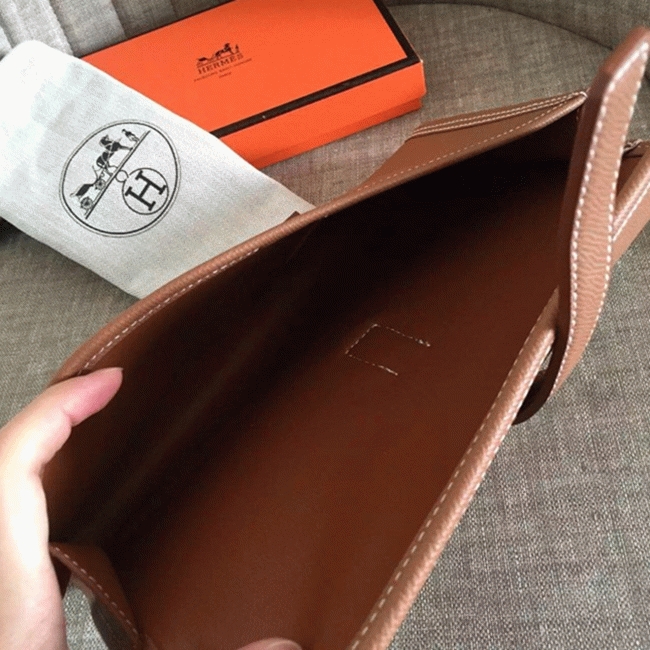 Brown knockoff H**me5 Jige Elan 29 clutch bag