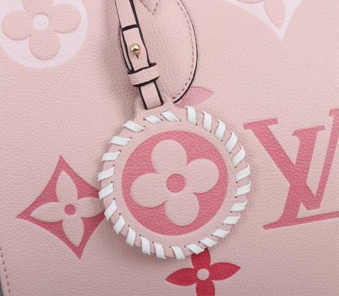 L0vis Vvtt0n Monogram Empreinte Leather Onthego MM Bag In Pink