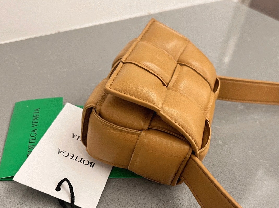 Top Quality Fake B0tt*ga Ven*ta Candy Padded Cassette Bag In Camel