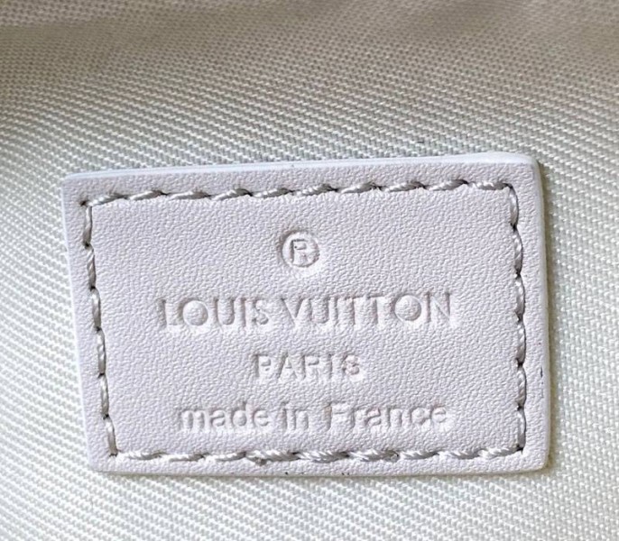 L0vis Vvtt0n Monogram Empreinte Petite Malle Souple Handbag In Cream