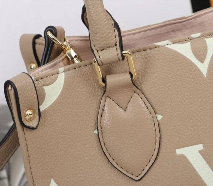 L0vis Vvtt0n Bicolor Monogram Empreinte Leather Onthego PM Bag In Tourterelle Gray And Cream