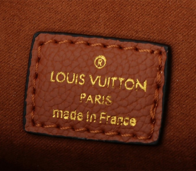L0vis Vvtt0n Monogram Empreinte Metis Handbag In Cognac Brown
