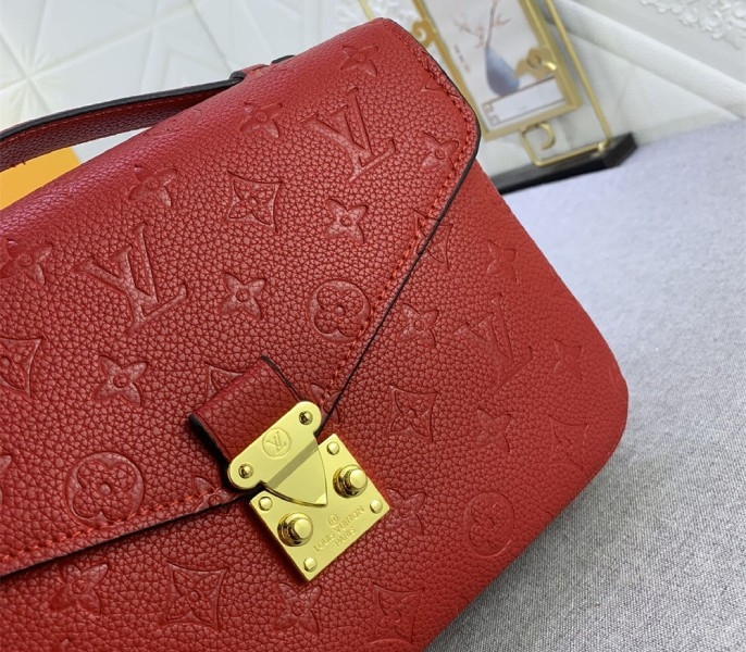LV Monogram Empreinte Leather Metis In Red