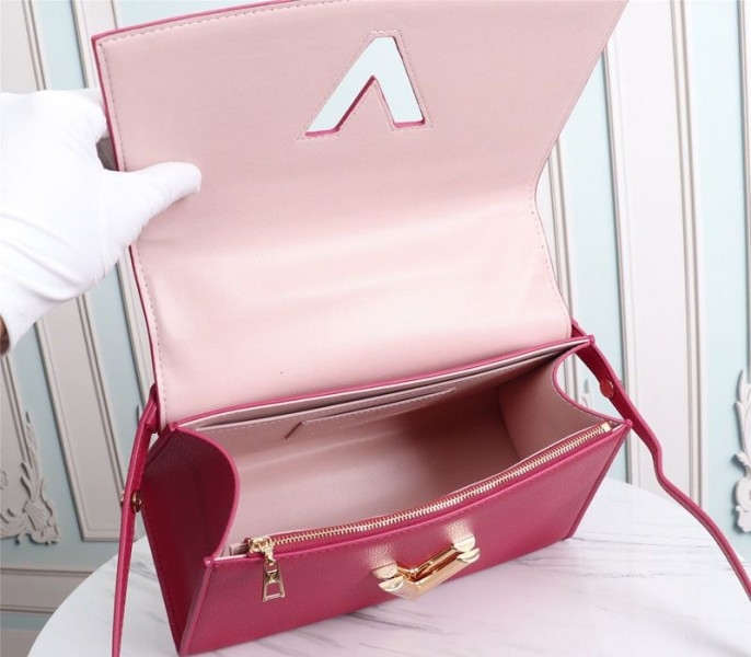 L0vis Vvtt0n Twist One Handle MM Handbag In Rose