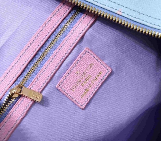 l0vis vvtt0n spring 2022 keepall 45 lU*gage in sunrise pastel