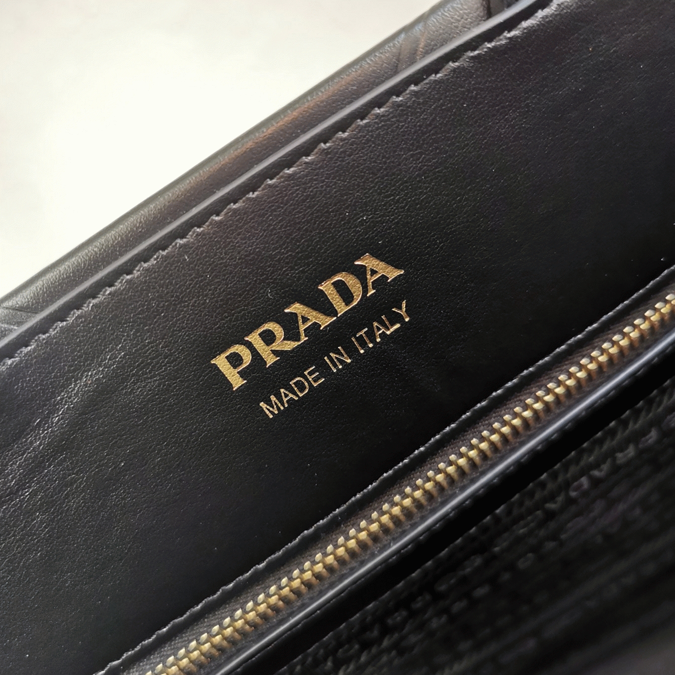 Pra*a Symbole Small Bag Fake with Topstitching in Black