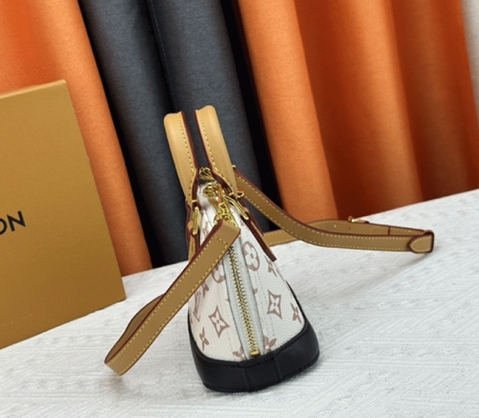 L0vis Vvtt0n Monogram Dune Canvas Nano Alma Bag