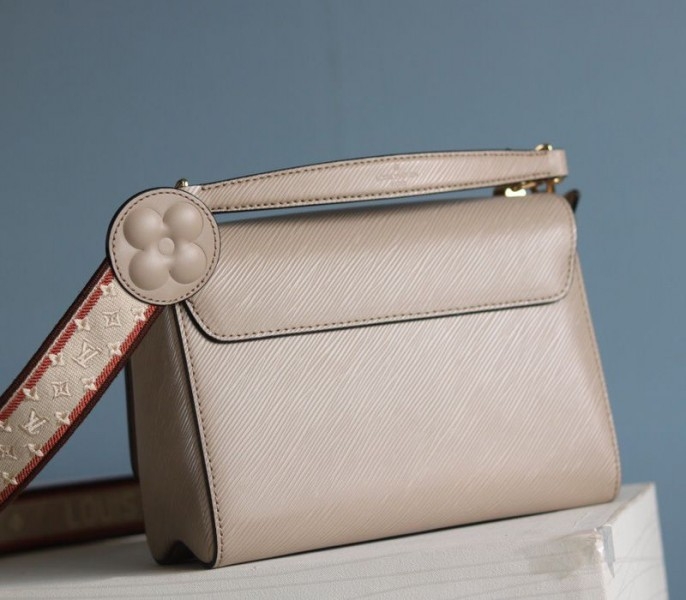 L0vis Vvtt0n Epi Leather Twist MM Handbag In Galet Gray With Embroidered Strap