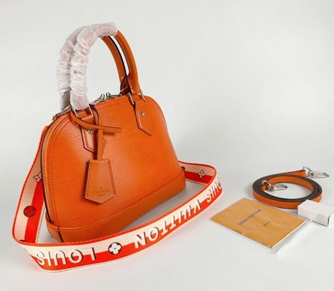 L0vis Vvtt0n Epi Leather Alma BB Handbag In Orange With Jacquard Strap