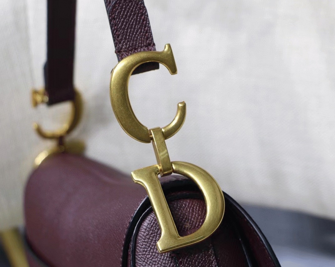 d10r saddle bag knockoff in aM*ranth grained calfskin