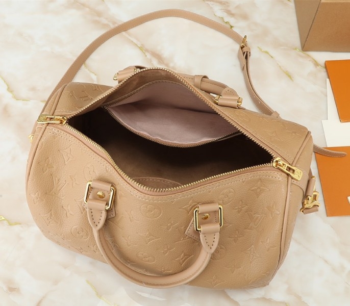 L0vis Vvtt0n Monogram Empreinte Speedy Soft 30 Handbag In Apricot
